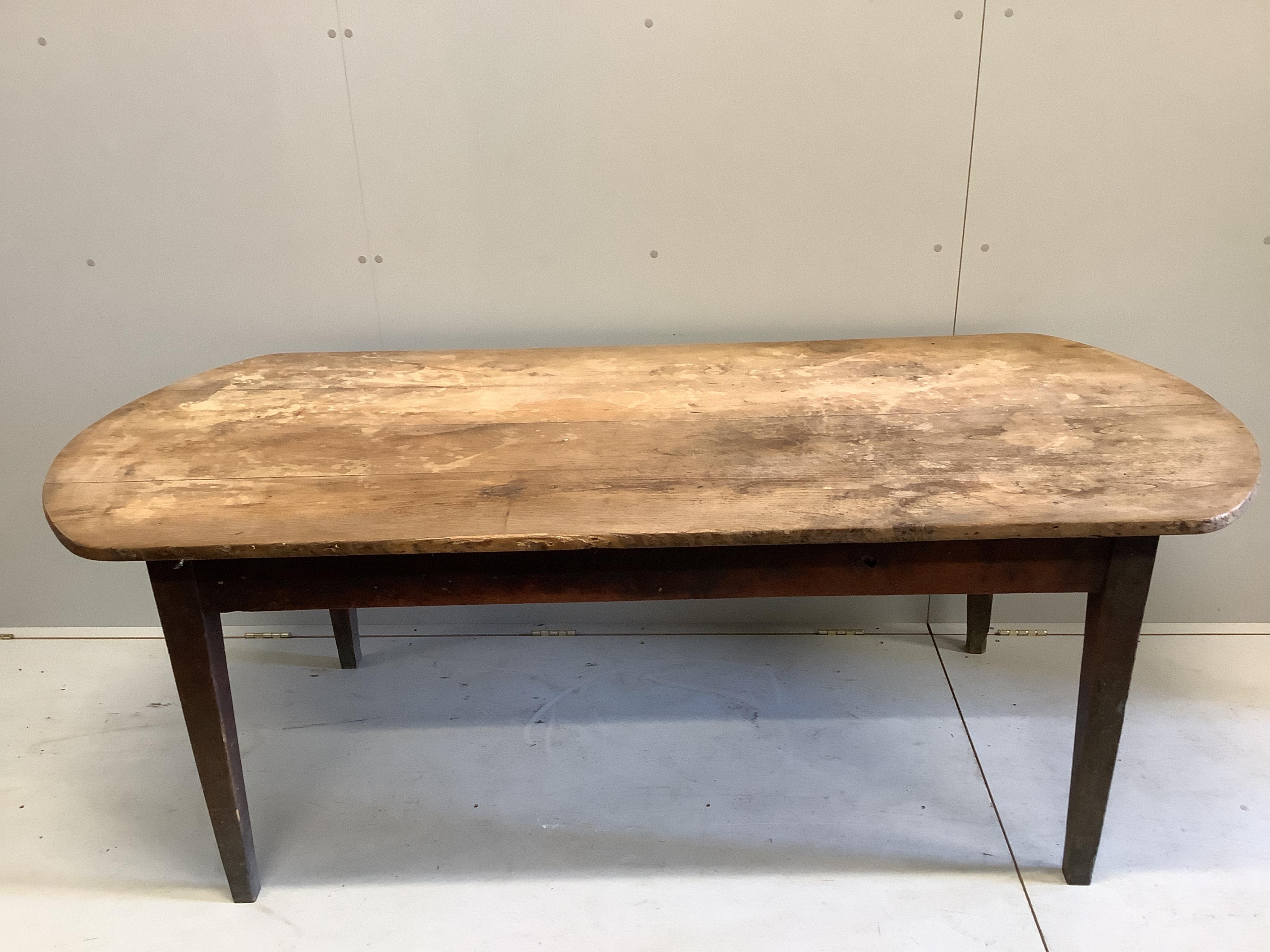 A French oak kitchen table, width 196cm, depth 87cm, height 72cm. Condition - well worn condition but essentially sound